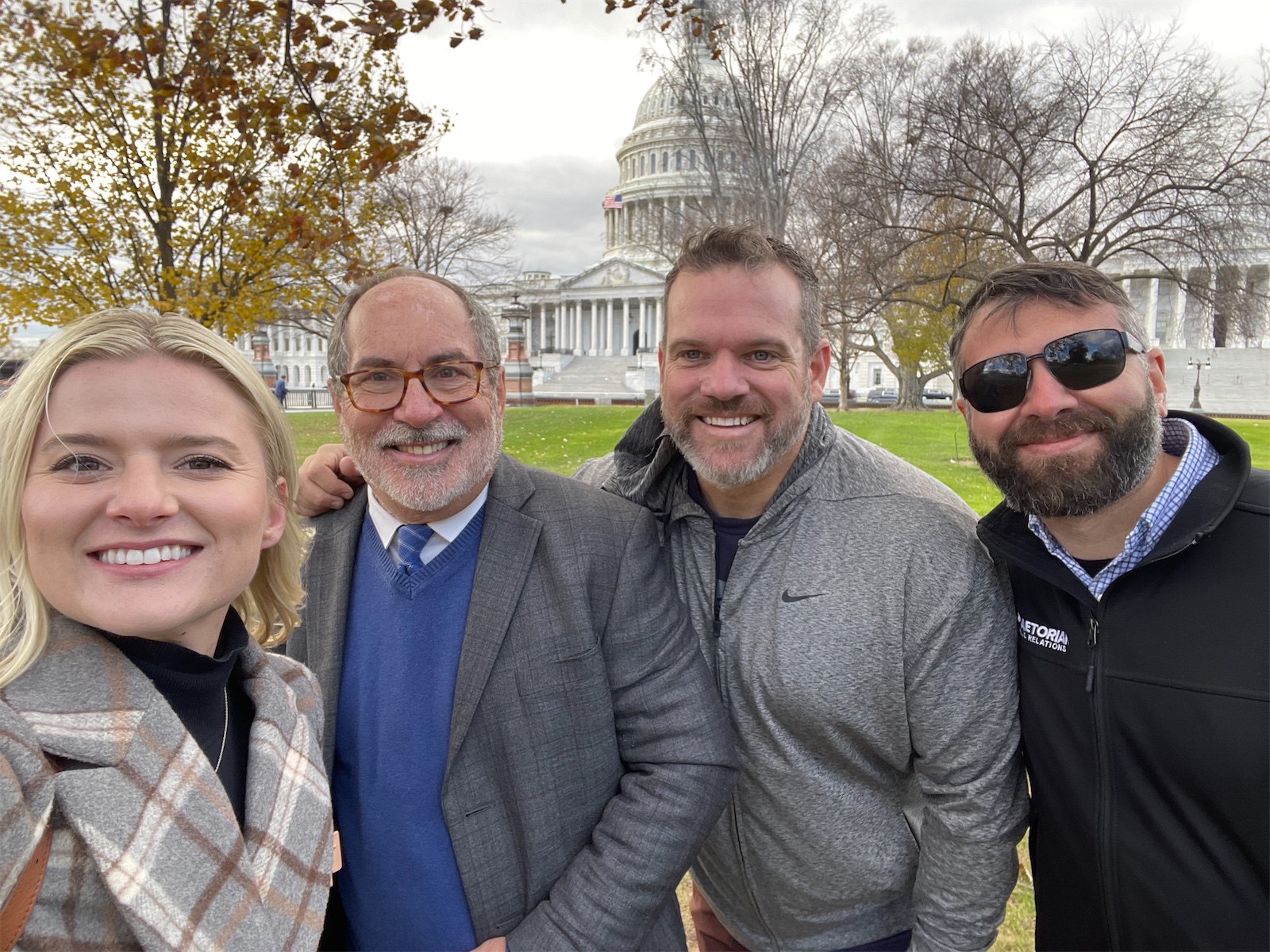 Daytona Everett, Matt Shupe, and colleagues in front of the U.S. Capitol